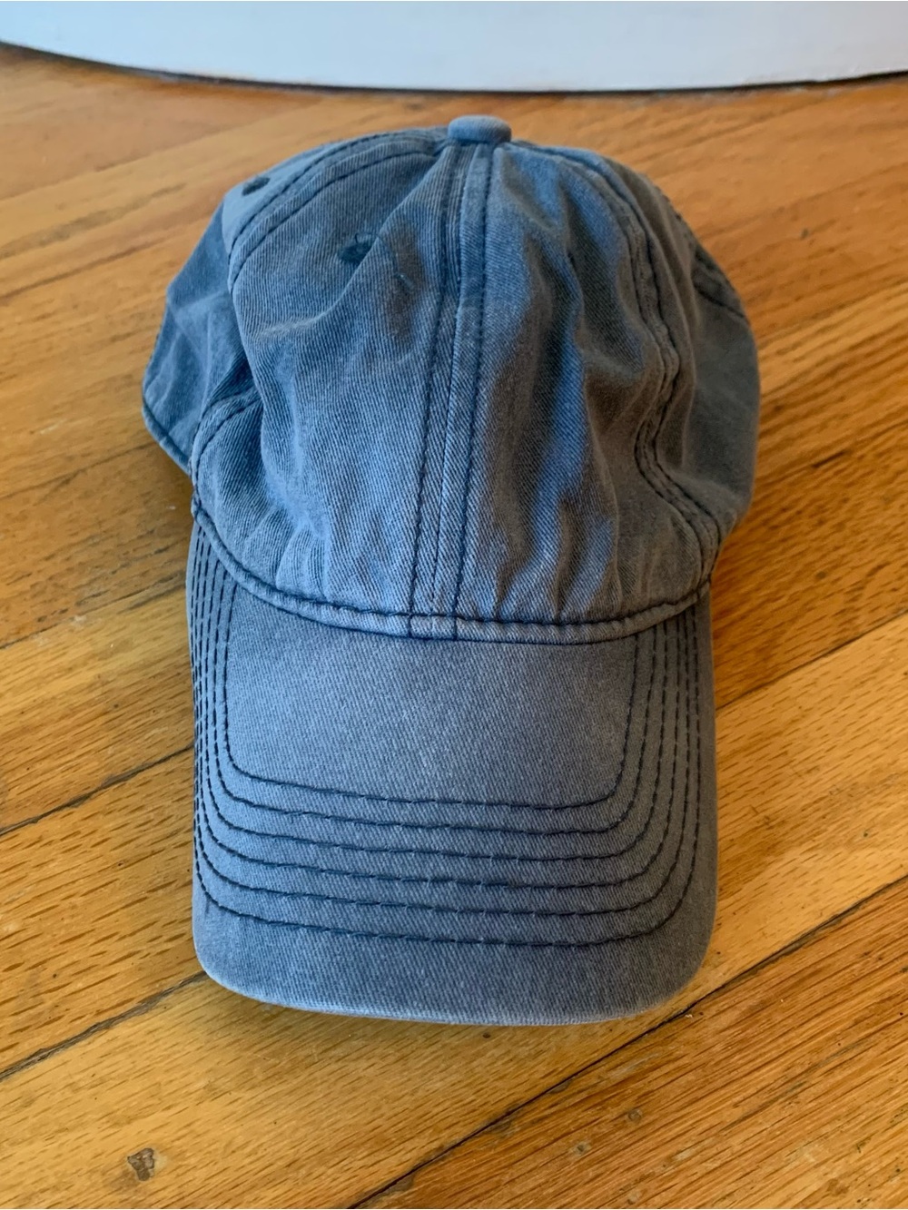 Blue baseball cap with adjustable strap